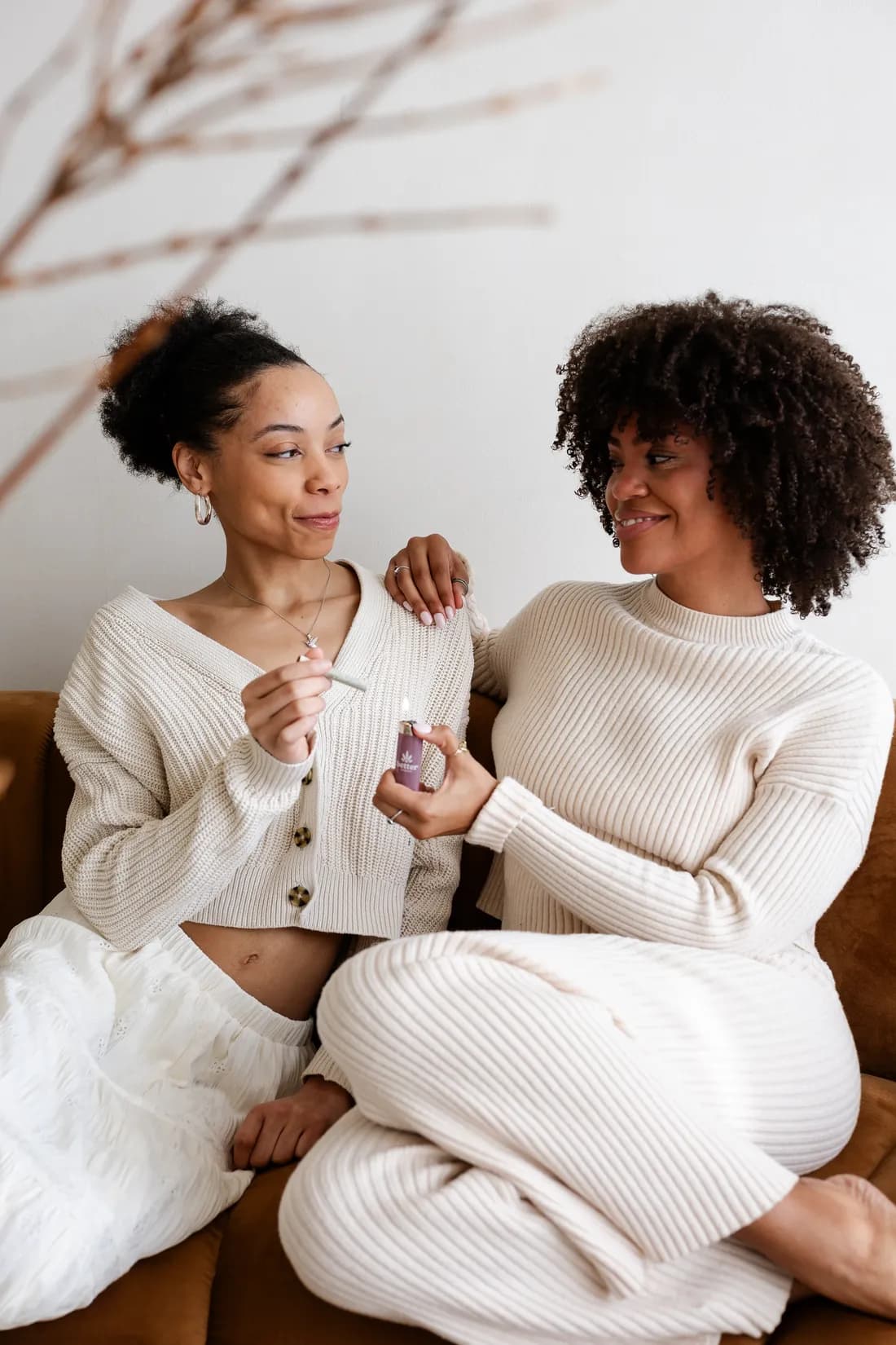 Two friends relaxing together with Better Cannabis